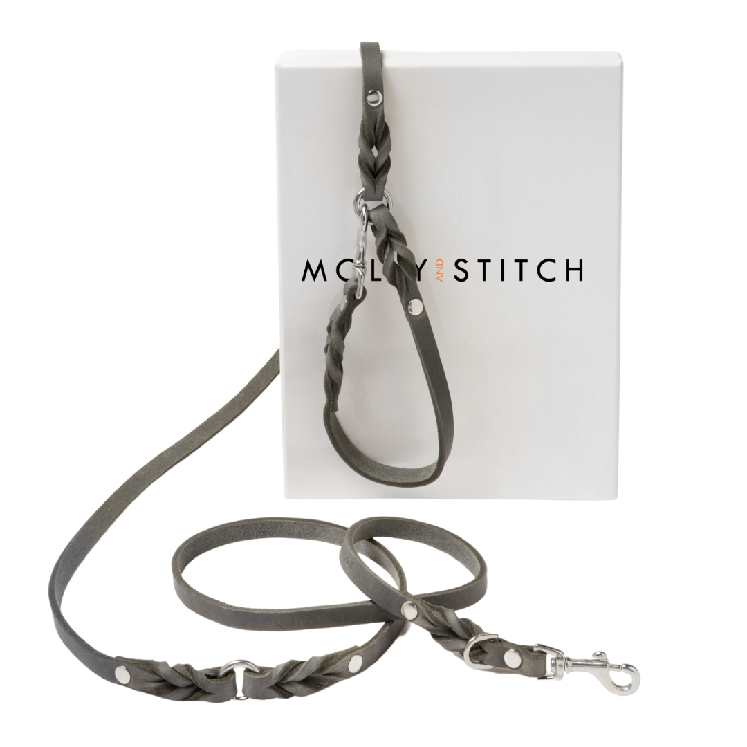 Grey leather handcrafted leash with adjustable length, solid steel clasps, and a clip-on handle